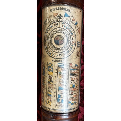 686 - An antique leather bound brass single draw telescope with a cut out panel revealing Naval Signal Fla... 