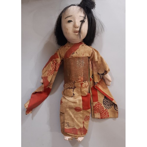 896 - Two early 20th century dolls comprising a bisque head shoulder head doll with jointed kid body, comp... 