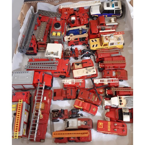 900 - A collection of unboxed Fire Service vehicles including large models by Corgi, Metz, Solido, others ... 