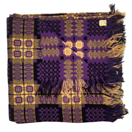 913 - Traditional woollen Welsh blanket in reversible double weave with fringed edges. Colours are purple,... 