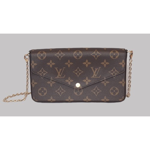 7 - Louis Vuitton Pochette Félicie Bag in Monogram canvas and lined in fuchsia microfibre. The bag is en... 