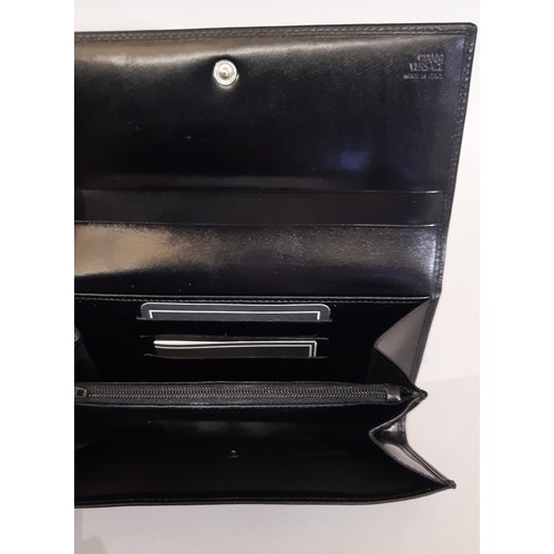 11 - Gianni Versace ladies' wallet/ purse and key purse in black leather, boxed and unused with dust clot... 