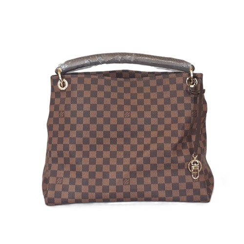 13 - Large handbag in the style of a Louis Vuitton Artsy bag, featuring a single handle with  braided det... 