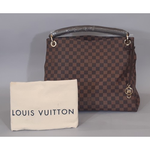 13 - Large handbag in the style of a Louis Vuitton Artsy bag, featuring a single handle with  braided det... 