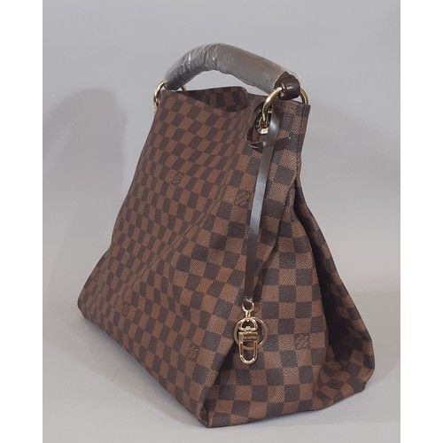 13 - Large handbag in the style of a Louis Vuitton Artsy bag, featuring a single handle with  braided det... 