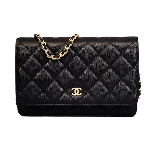 15 - Black Quilted Caviar Wallet by Chanel 2018-19 with gold chain, zipped inner compartments and card sl... 