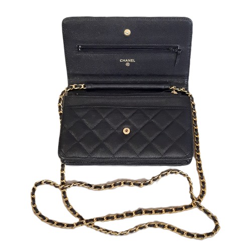 15 - Black Quilted Caviar Wallet by Chanel 2018-19 with gold chain, zipped inner compartments and card sl... 