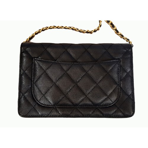 15 - Black Quilted Caviar Wallet by Chanel 2018-19 with gold chain, zipped inner compartments and card sl... 