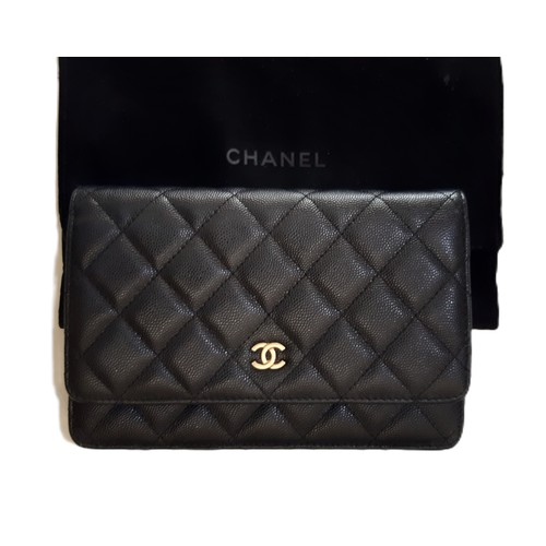 15 - Black Quilted Caviar Wallet by Chanel 2018-19 with gold chain, zipped inner compartments and card sl... 