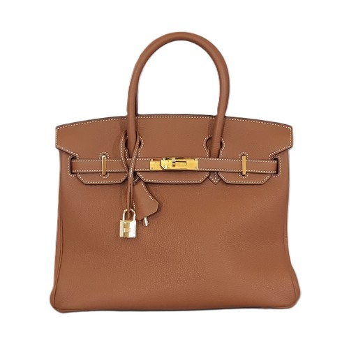 20 - A Birkin 30 bag by Hermes in Gold Epsom leather with gold hardware 2021. Unused, with padlock and ke... 