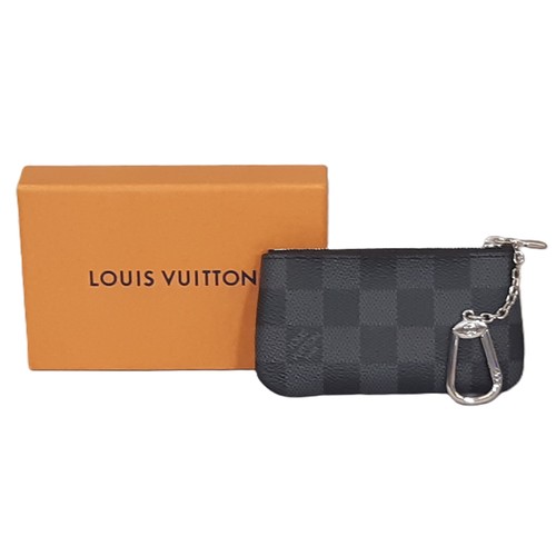 31 - Louis Vuitton key pouch in Damier Graphite canvas with zip closure, leather lining and key ring. 12x... 