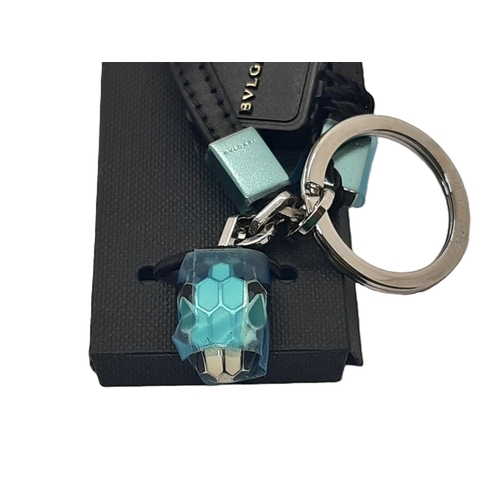 34 - Bulgari Serpenti keyring with snakehead motif fob, leather band and silver hardware. In box, unused,... 