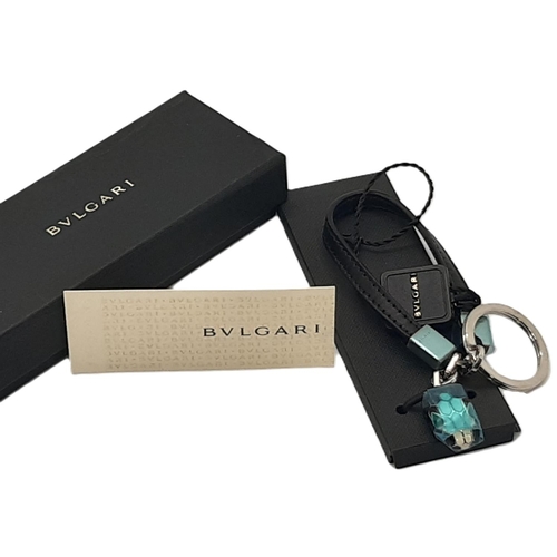 34 - Bulgari Serpenti keyring with snakehead motif fob, leather band and silver hardware. In box, unused,... 