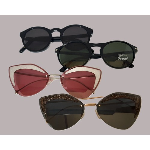 39 - Four pairs of women's sunglasses including two pairs of Cat Eye type by Fendi, one pair by Persol an... 