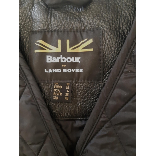 43 - Barbour for Land Rover women's black oilskin jacket with corduroy collar and tartan lining, together... 