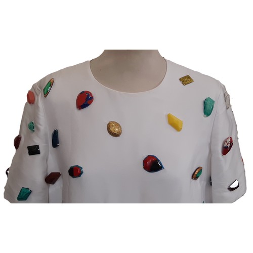 58 - Short sleeved shift dress by Stella McCartney in white with coloured stone embellishments. No size l... 