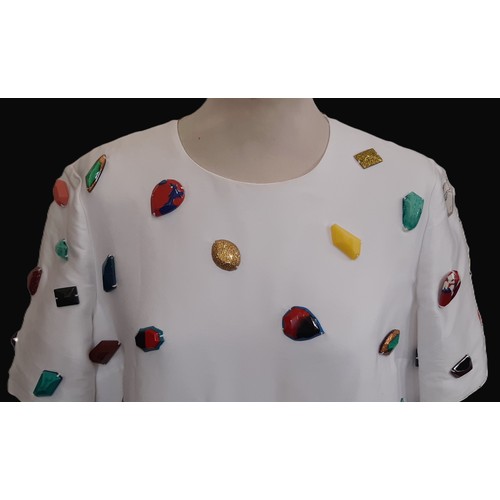 58 - Short sleeved shift dress by Stella McCartney in white with coloured stone embellishments. No size l... 