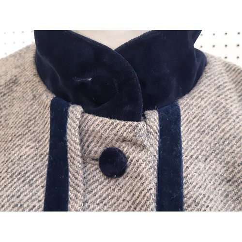 60 - Laura Ashley woollen tweed cape in a twill weave with navy velvet collar, buttons and trim. One size... 