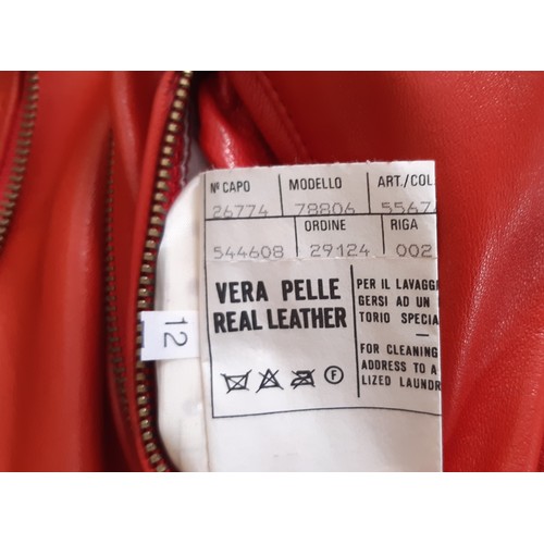 61 - Red leather women's jacket by Moschino with embroidered  writing verso, size 12