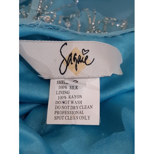 62 - Evening dress by Sagaie in  turquoise silk with beading to front and back and with stretch quality f... 