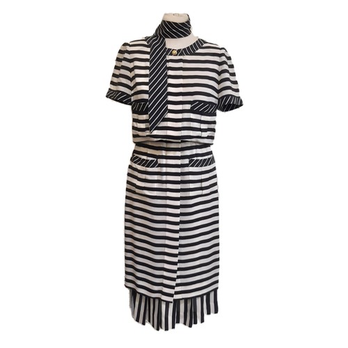 63 - Chanel Boutique dress 1992 in black and white striped silk, with concealed front button fastening, 4... 