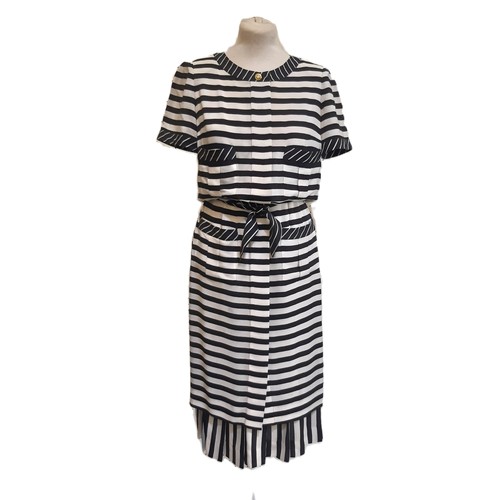 63 - Chanel Boutique dress 1992 in black and white striped silk, with concealed front button fastening, 4... 