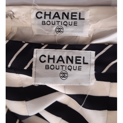 63 - Chanel Boutique dress 1992 in black and white striped silk, with concealed front button fastening, 4... 