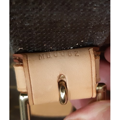 69 - Louis Vuitton satellite 70 suitcase in monogrammed canvas and natural leather made in France 2002, (... 