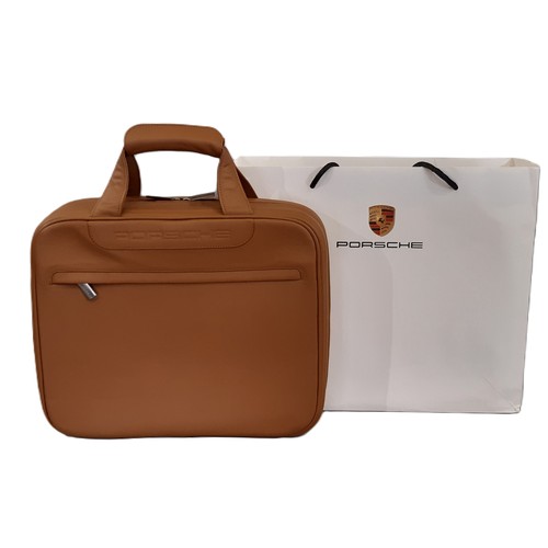 77 - Porsche leather bag briefcase/ business bag with top handles, outer zipped pocket and fitted lined i... 