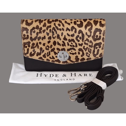 83 - 'Selbourne Crossbody' handbag by Hyde & Hare of Italian cowhide print and grained leather with front... 