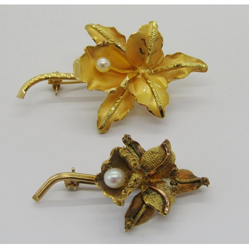 406 - Two vintage Venezuelan orchid brooches, each stamped '18k', 9.4g total, with a Venezuelan box