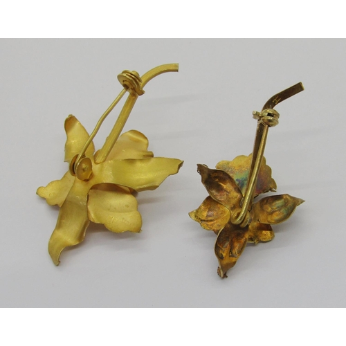 406 - Two vintage Venezuelan orchid brooches, each stamped '18k', 9.4g total, with a Venezuelan box