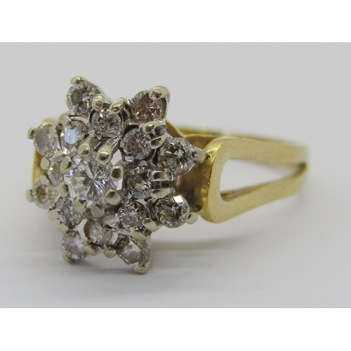 407 - 18ct diamond cluster ring, centre stone 0.20ct approx, size N/O, 4.5g