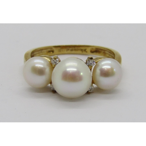 421 - Modern 9k pearl and diamond dress ring, size N, 2.8g, together with a collection of silver jewellery... 