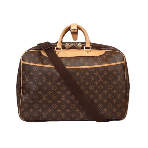 100 - Louis Vuitton Alize 45 travel bag in Monogram Canvas with Vachetta leather trim. The bag has detacha... 