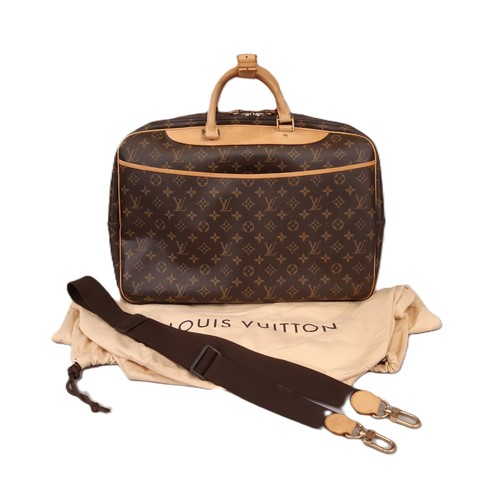 100 - Louis Vuitton Alize 45 travel bag in Monogram Canvas with Vachetta leather trim. The bag has detacha... 