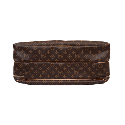 100 - Louis Vuitton Alize 45 travel bag in Monogram Canvas with Vachetta leather trim. The bag has detacha... 