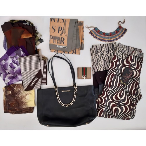 918 - A mixed lot of ladies accessories including Michael Kors handbag in black leather with Coccinelle pu... 