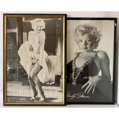 1841 - Two large black and white photographs of Marilyn Monroe, 66 x 97 cm, both framed and glazed (crack t... 