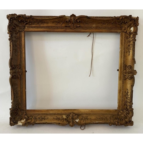 1947 - A 19th century gilt gesso picture with moulded foliate decorations, interior frame dimensions: 52 x ... 