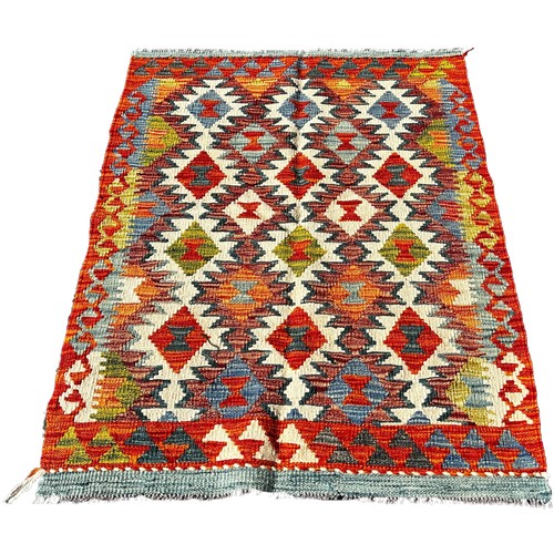 1672 - A Chobi kilim with an all over multi coloured stepped diamond pattern 118cm x 86cm approximately