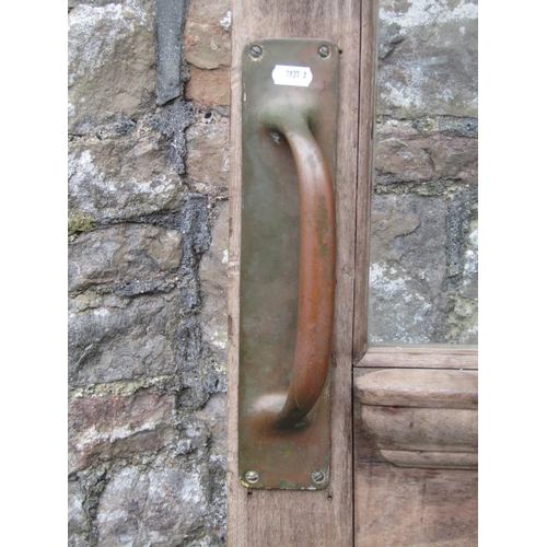 1075 - An reclaimed stripped and weathered hardwood partially glazed panelled door, 208cm high x 76cm wide