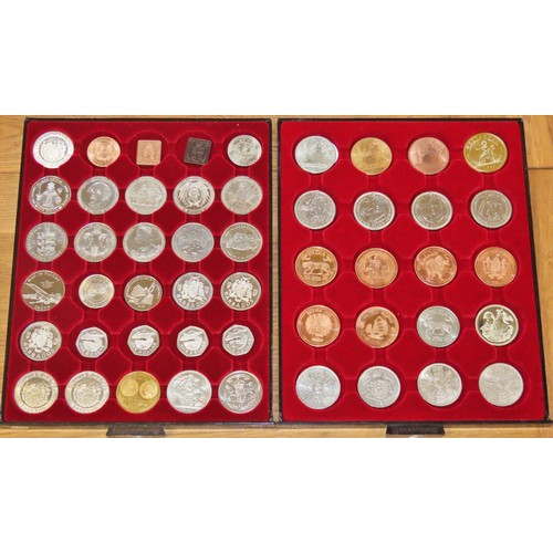 351 - Two leuchtturn coin trays containing various world coins including proof Barbados issues, fantasy Ed... 