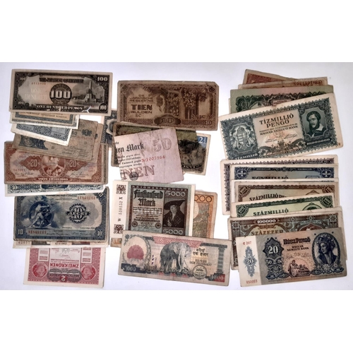 355 - A quantity of world banknotes including mid 20th century Hungarian, early 20th century Austrian, Nep... 