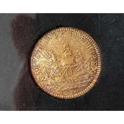 373 - A gold re strike of a Charles II touch piece, depicting a ship in full sail and St. Michael and the ... 