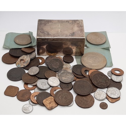 387 - A small white metal box with cross motif to cover, containing a group of coins / medallions to inclu... 