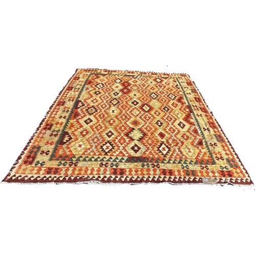 1660 - A kilim with an all over stepped diamond pattern 250cm x 195cm approximately