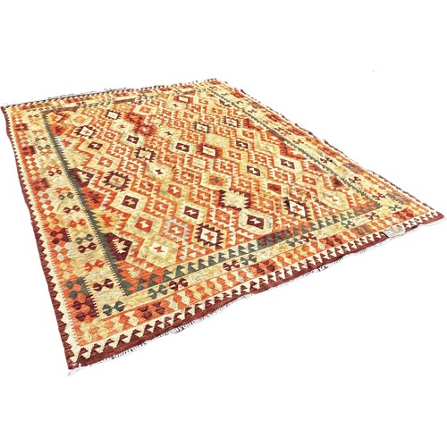 1660 - A kilim with an all over stepped diamond pattern 250cm x 195cm approximately