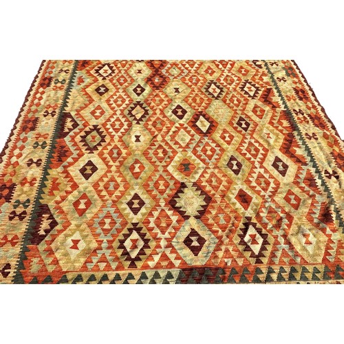 1660 - A kilim with an all over stepped diamond pattern 250cm x 195cm approximately