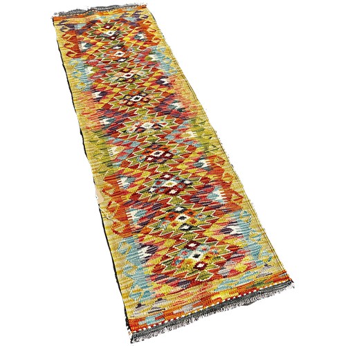 1657 - A Chobi kilim runner with a central row of stepped diamonds, 202cm x 60cm approximately